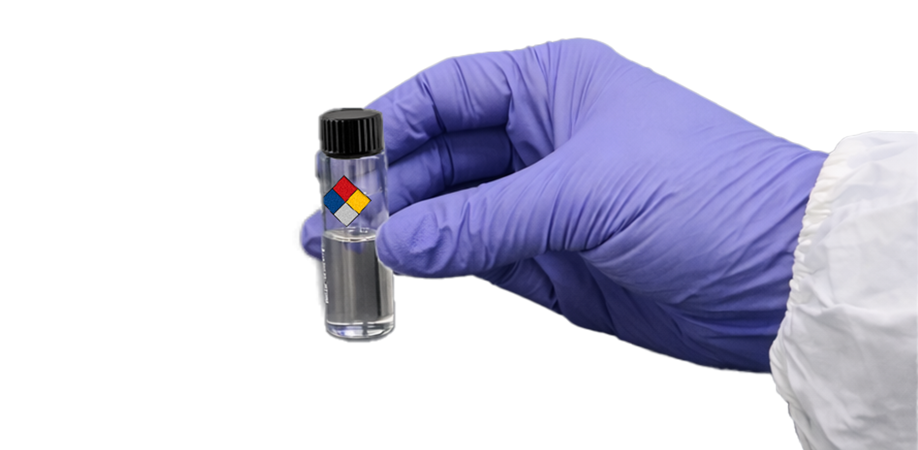 A gloved hand holding a half-filled 15 mL vial with a "hazardous" label